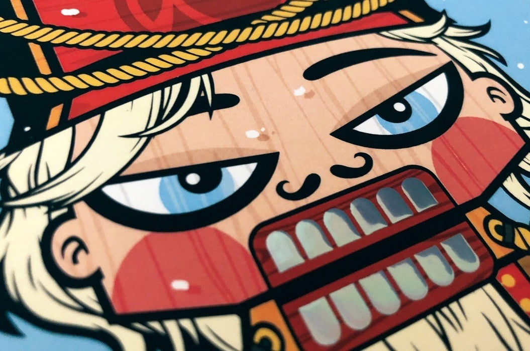 Close-up detail of nutcracker illustration on 19pt suede holiday greeting card featuring 3D raised foil accents