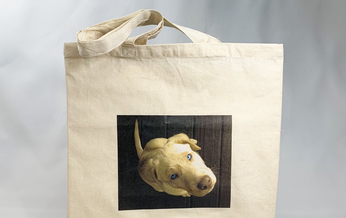 Natural cotton tote bag custom printed with a full-color yellow lab dog named butters portrait graphic