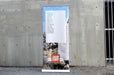 Front view of a premium 33x80 inch retractable banner stand with vibrant custom printed indoor vinyl graphic
