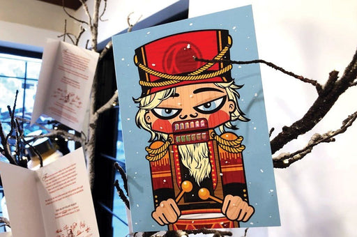 Nutcracker holiday greeting card sample on 19pt suede stock featuring 3D raised metallic foil accents 
