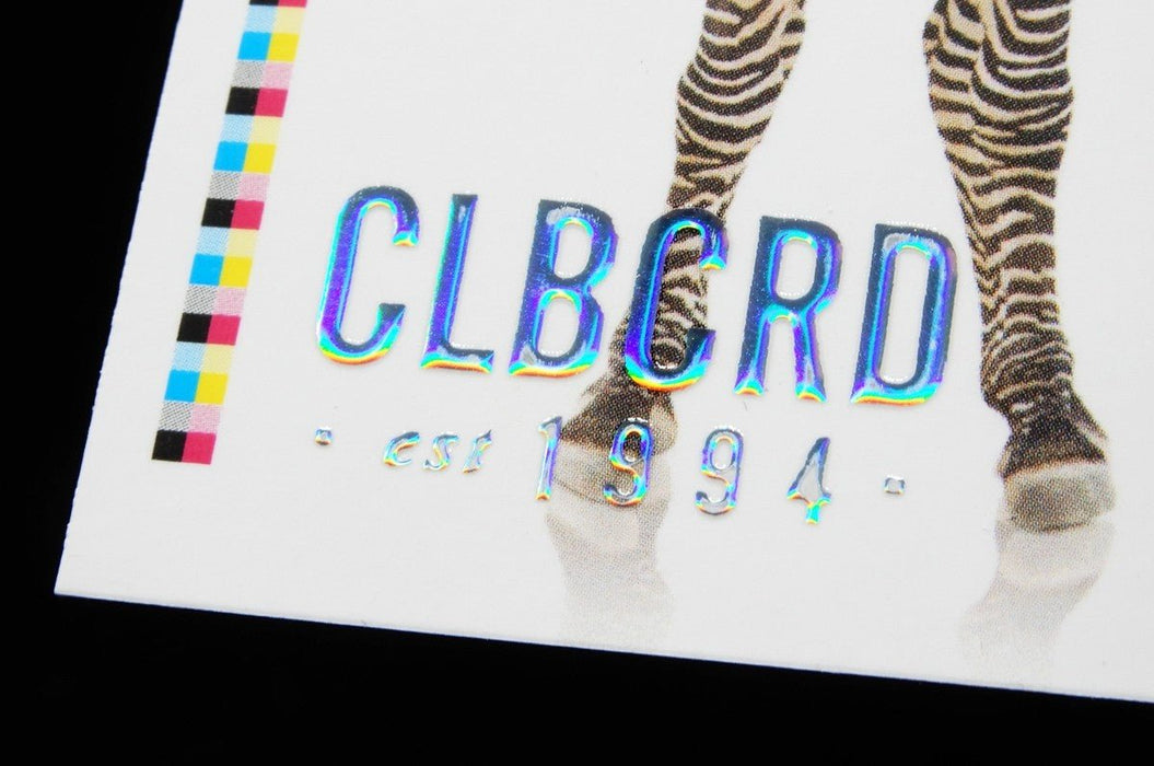 Clubcard sample card printed on 19pt suede stock featuring CLUBCARD logo and text in raised iridescent metallic foil