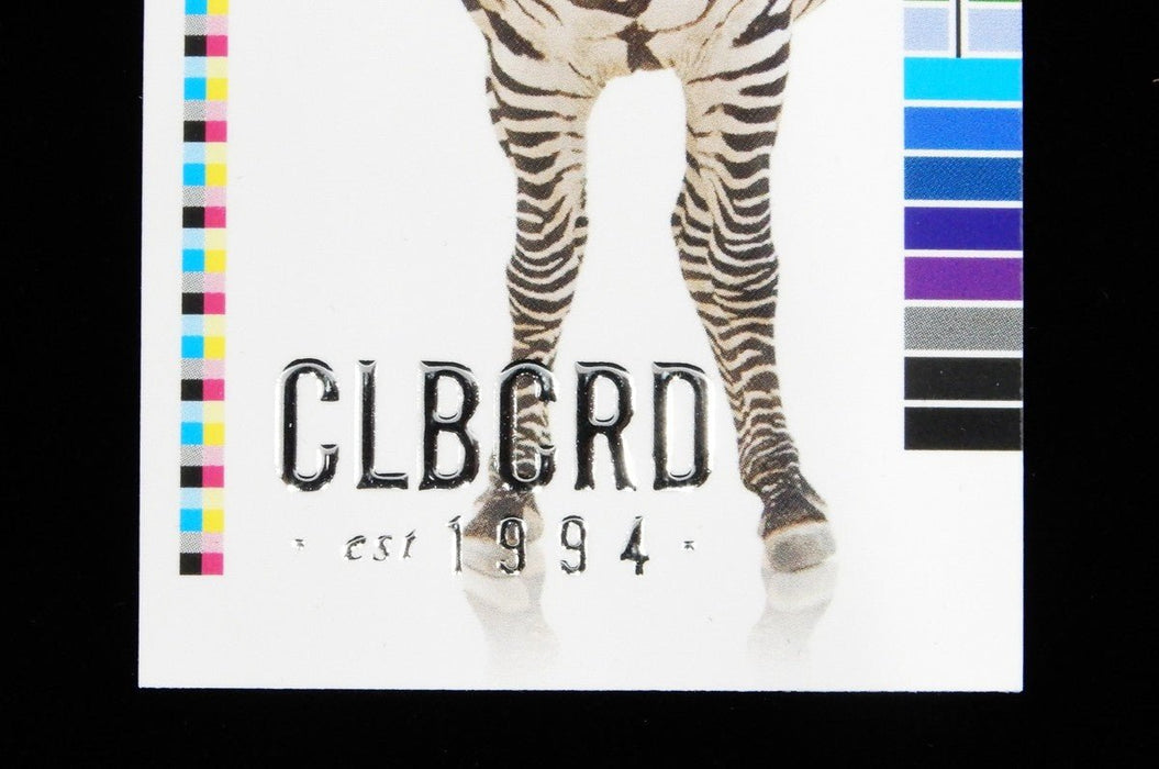 Clubcard sample card printed on 19pt suede stock featuring CLUBCARD logo and text in raised silver metallic foil