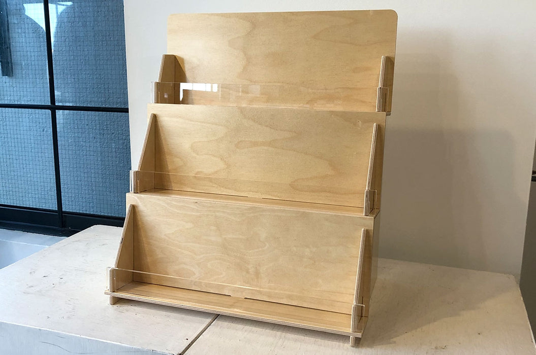 Birch plywood 3-tier full view card display stand with acrylic panels on each shelf.