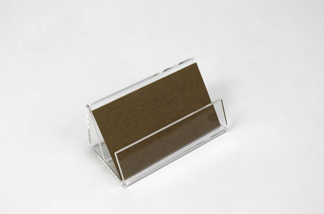 Horizontal clear acrylic business stand frame holding a kraft card on a white background.