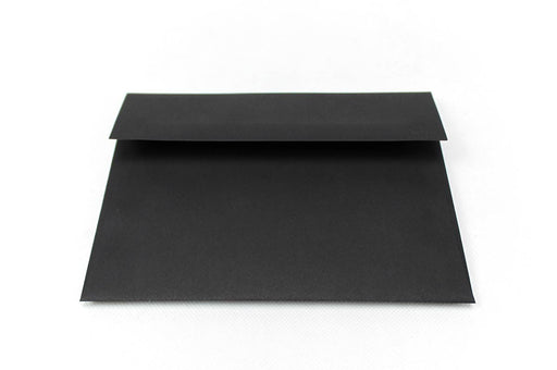 Front of an uncoated blank eclipse black envelope on a white background.
