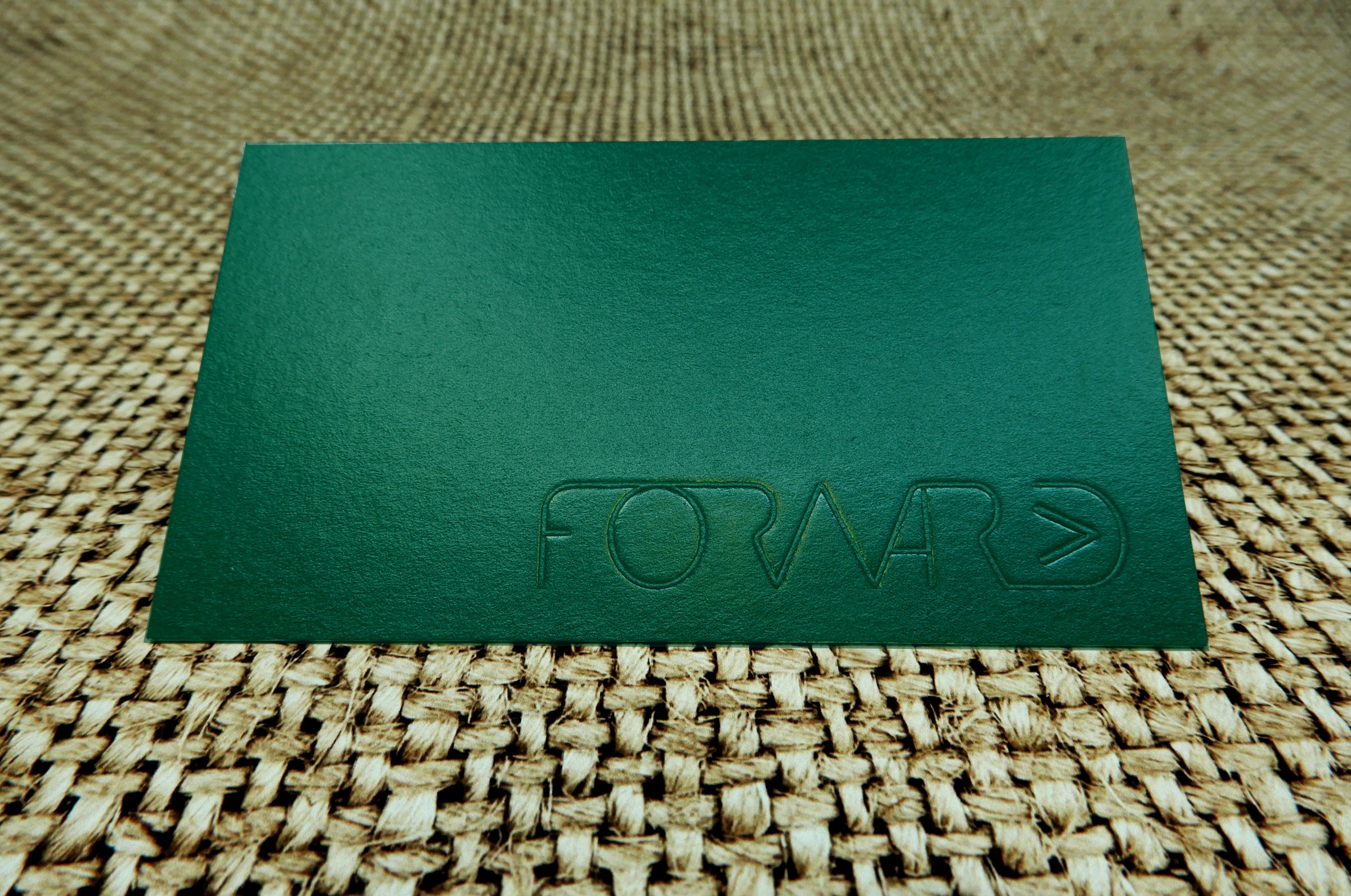 Custom business card for Forward with debossing | deep green color with forward logo debossed in the bottom right corner | Clubcard Printing USA