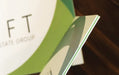 Close up showing the green color core layer of our 37pt Uncoated Color Core stock | Clubcard Printing USA